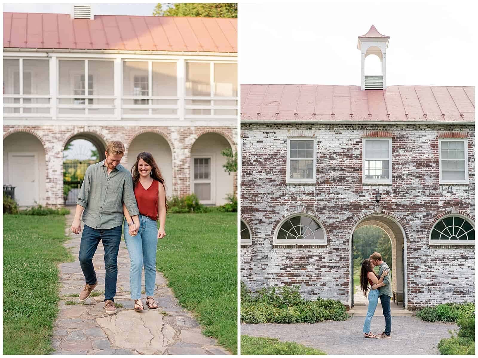 Engaged  couple stops and shares a kiss  in front of the historic building at Blandy Experimental Farm