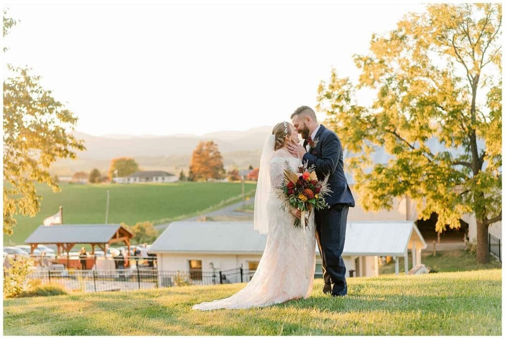Mt Solon wedding portrait taken at the top of the hill overlooking Mountain View Farm in Virginia, right at peak fall foliage season