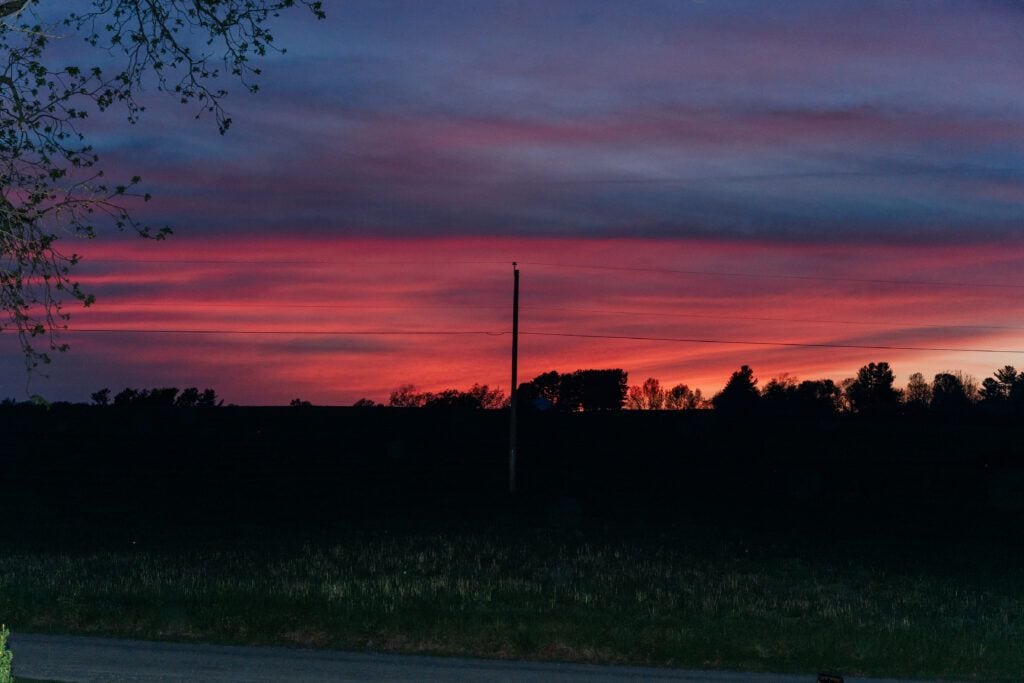 Colorful sunset in waynesboro at Sky Ridge Farm, a barn wedding venue in Waynesboro, VA, near the Blue Ridge Mountains. Photo by Wedding Phootography by Jo Mahaney, a Virginia wedding photographer.