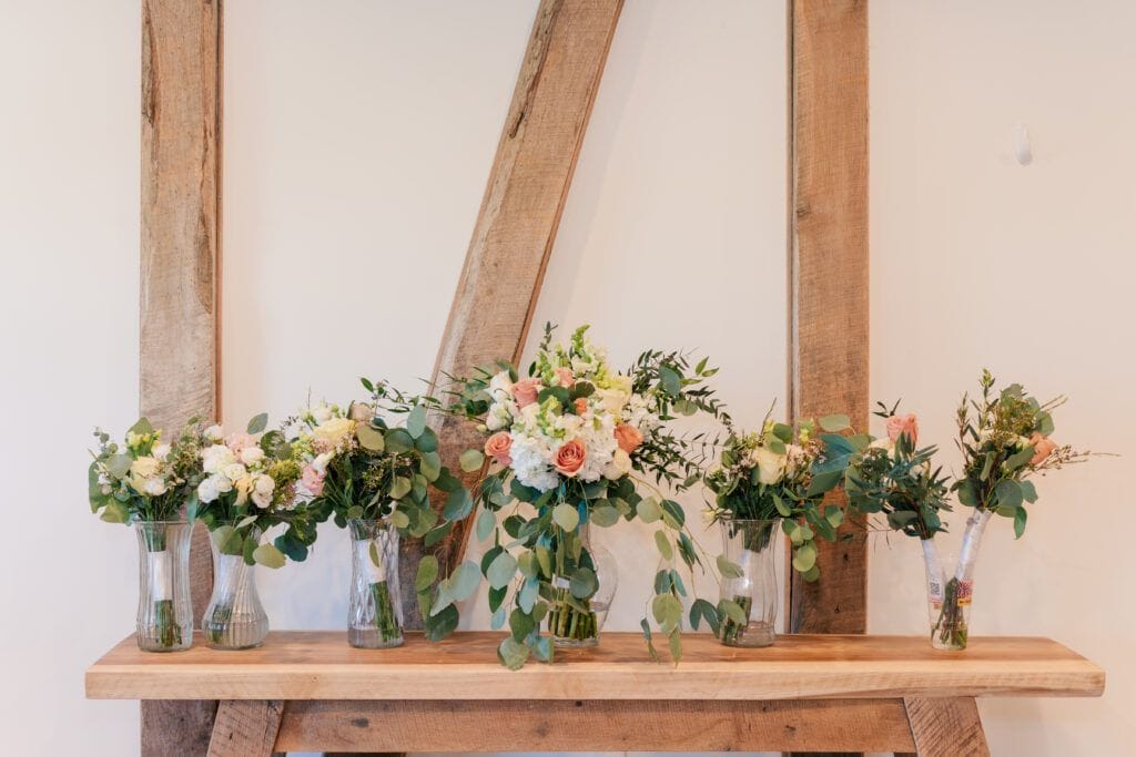 Bridal party bouquets at Sky Ridge Farm, a barn wedding venue in Waynesboro, VA, near the Blue Ridge Mountains. Photo by Wedding Phootography by Jo Mahaney, a Virginia wedding photographer.