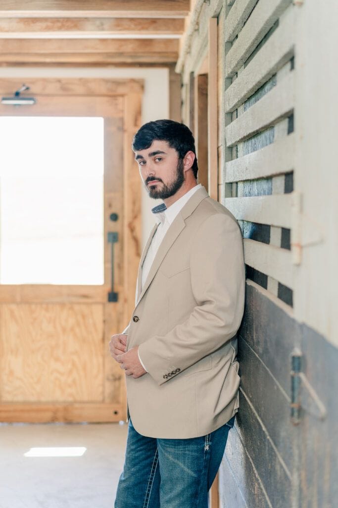 Groom preparing for wedding ceremony at Sky Ridge Farm, a barn wedding venue in Waynesboro, VA, near the Blue Ridge Mountains. Photo by Wedding Phootography by Jo Mahaney, a Virginia wedding photographer.
