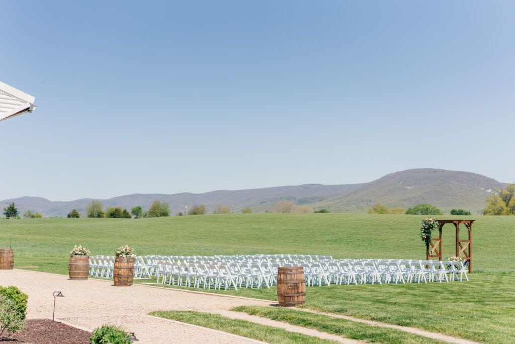 The field behind the wedding barn at Sky Ridge Farm, a barn wedding venue in Waynesboro, VA, near the Blue Ridge Mountains. Photo by Wedding Phootography by Jo Mahaney, a Virginia wedding photographer.