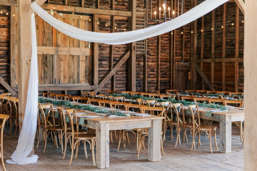 Barn interior reception space at Sky Ridge Farm, a barn wedding venue in Waynesboro, VA, near the Blue Ridge Mountains. Photo by Wedding Phootography by Jo Mahaney, a Virginia wedding photographer.