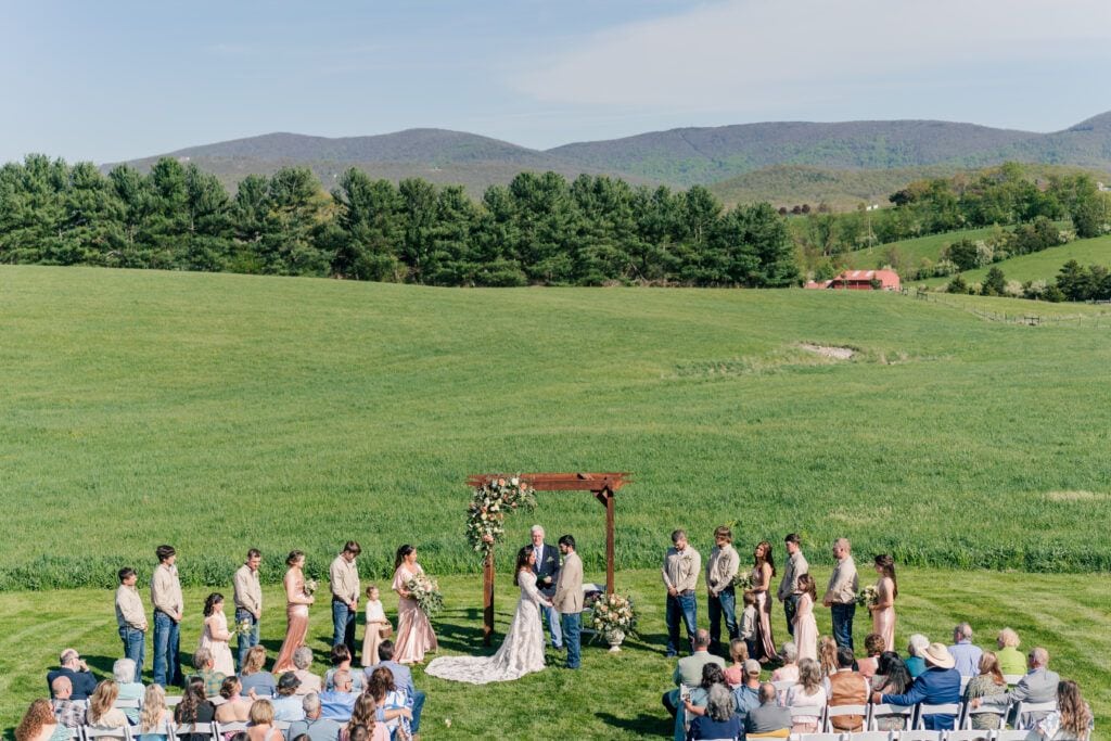 Ceremony site with mountain views at Sky Ridge Farm, a barn wedding venue in Waynesboro, VA, near the Blue Ridge Mountains. Photo by Wedding Phootography by Jo Mahaney, a Virginia wedding photographer.