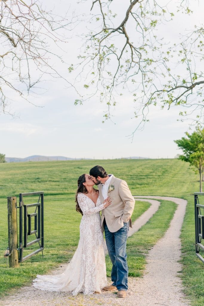 Couples portraits at Sky Ridge Farm, a barn wedding venue in Waynesboro, VA, near the Blue Ridge Mountains. Photo by Wedding Phootography by Jo Mahaney, a Virginia wedding photographer.