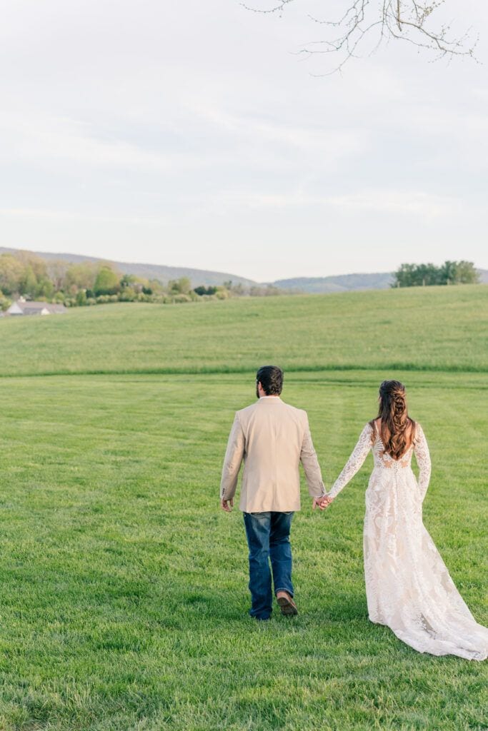 Evening portraits at Sky Ridge Farm, a barn wedding venue in Waynesboro, VA, near the Blue Ridge Mountains. Photo by Wedding Phootography by Jo Mahaney, a Virginia wedding photographer.