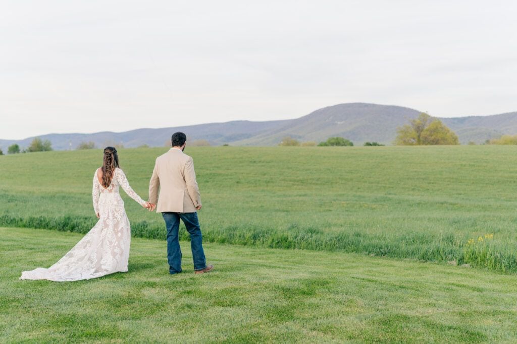 Sunset portraits at Sky Ridge Farm, a barn wedding venue in Waynesboro, VA, near the Blue Ridge Mountains. Photo by Wedding Phootography by Jo Mahaney, a Virginia wedding photographer.